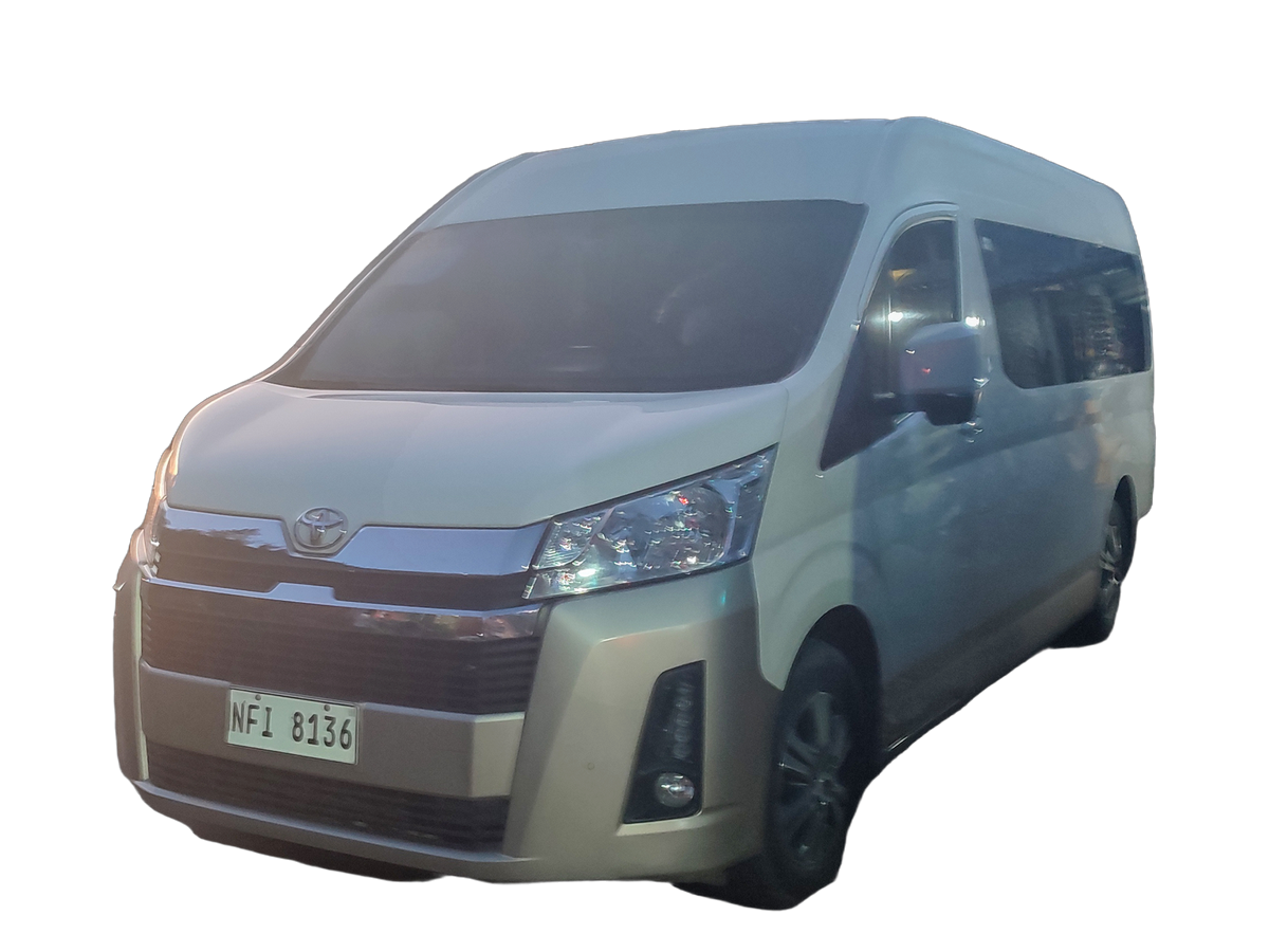 White Toyota Hiace Premio 14-seater tourist minibus used for Bali group tours and airport transfers