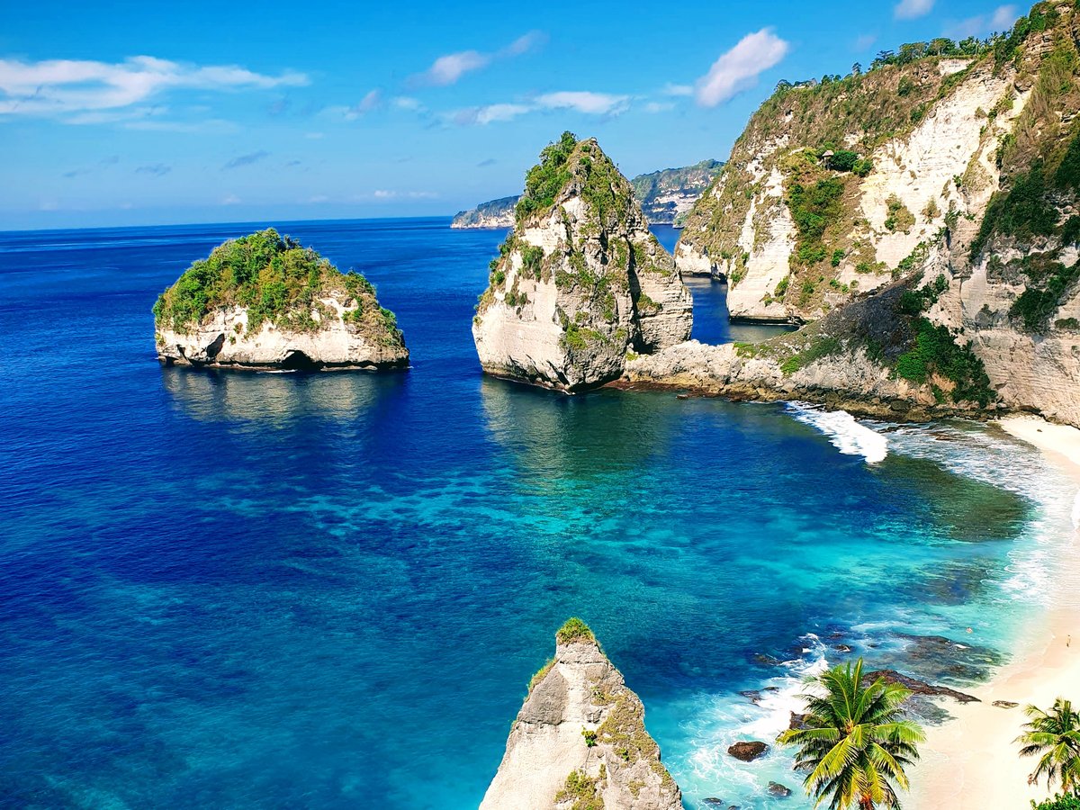 Carved limestone staircase leading down the cliff to Diamond Beach on Nusa Penida east coast