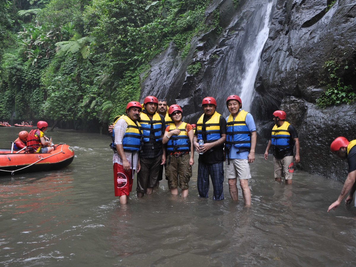 Steep stone staircase down to the Ayung river rafting start point through Bali rice terraces